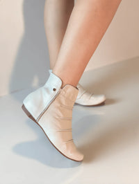 BOTA TINA